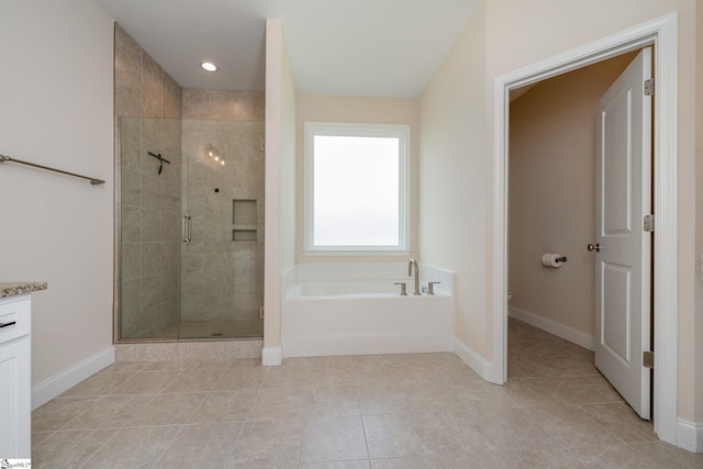 bathroom featuring tile patterned flooring, independent shower and bath, and toilet