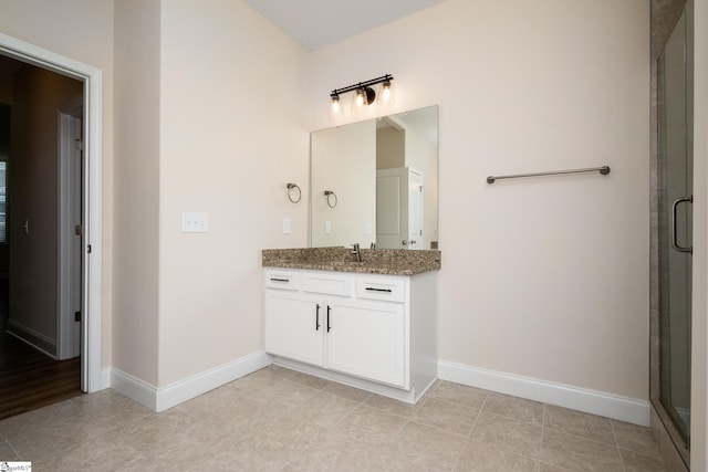 bathroom featuring vanity and walk in shower