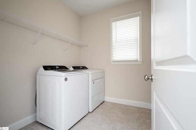 laundry room with washer and clothes dryer