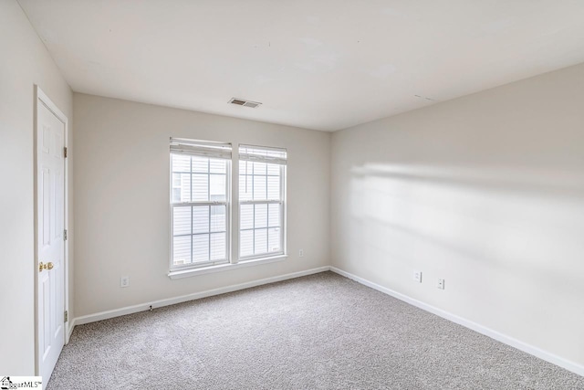 view of carpeted spare room