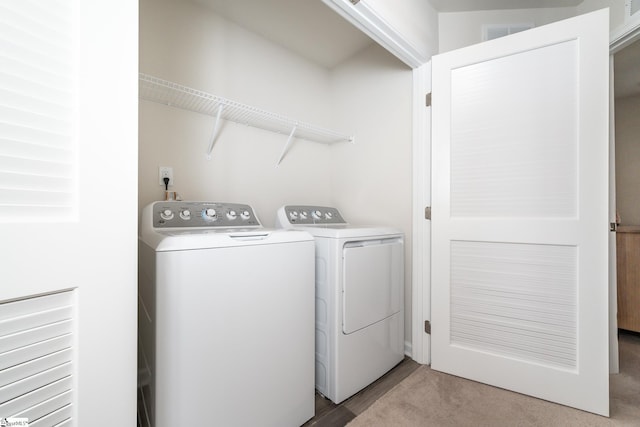 laundry room with washing machine and dryer