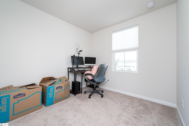 office area with light colored carpet