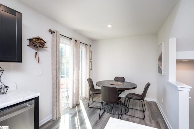 dining area with light hardwood / wood-style floors