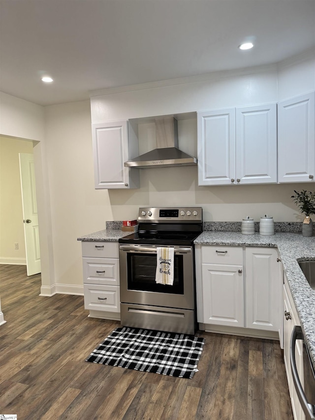 kitchen with wall chimney range hood, stainless steel electric range, dishwasher, white cabinetry, and light stone countertops