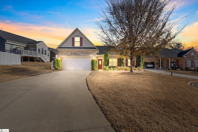 view of front of property with a garage