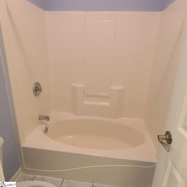 bathroom with shower / bathing tub combination