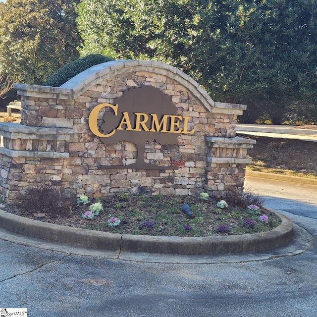 view of community sign