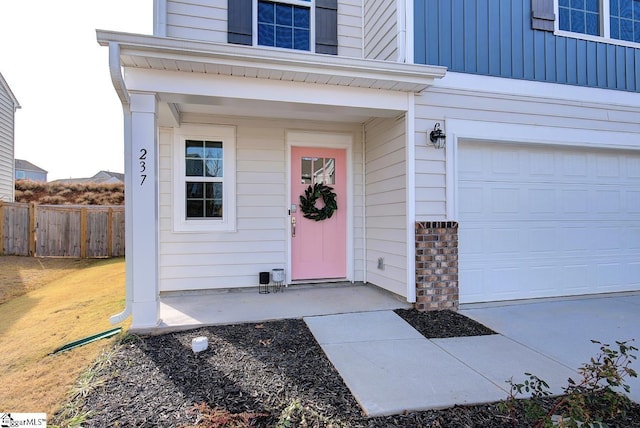 doorway to property featuring a garage