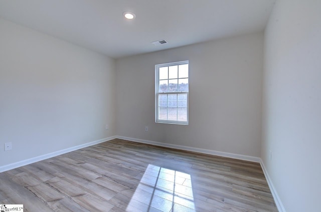 empty room with light wood-type flooring