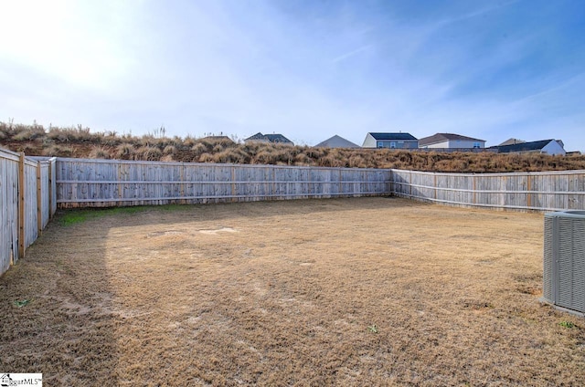 view of yard featuring central AC