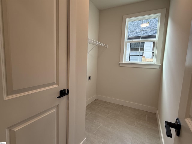 washroom featuring hookup for an electric dryer