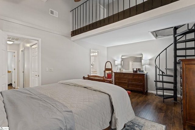 bedroom featuring dark hardwood / wood-style floors