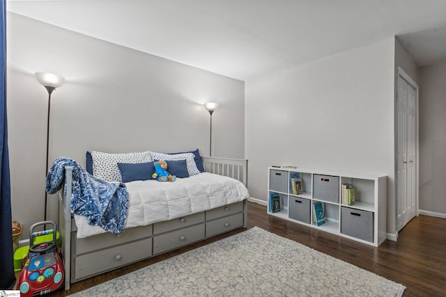 bedroom featuring dark hardwood / wood-style floors