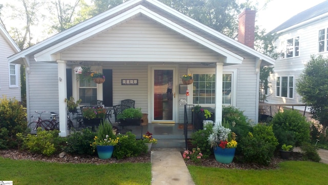 bungalow featuring a porch