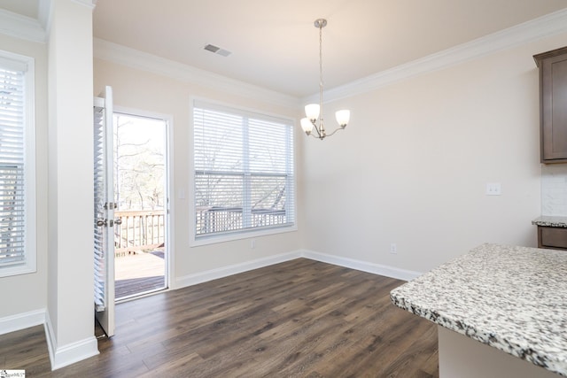 dining space with a healthy amount of sunlight, ornamental molding, and dark wood-type flooring