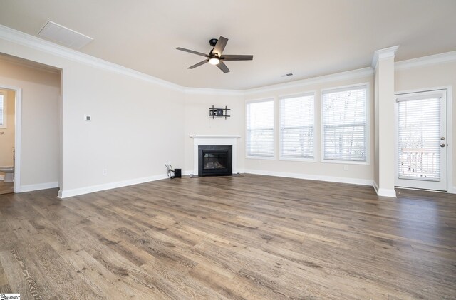 unfurnished living room featuring hardwood / wood-style floors, ceiling fan, and ornamental molding