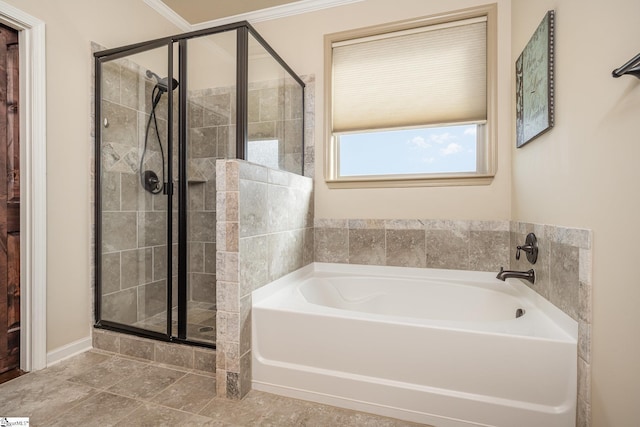 bathroom featuring separate shower and tub, crown molding, and tile patterned flooring