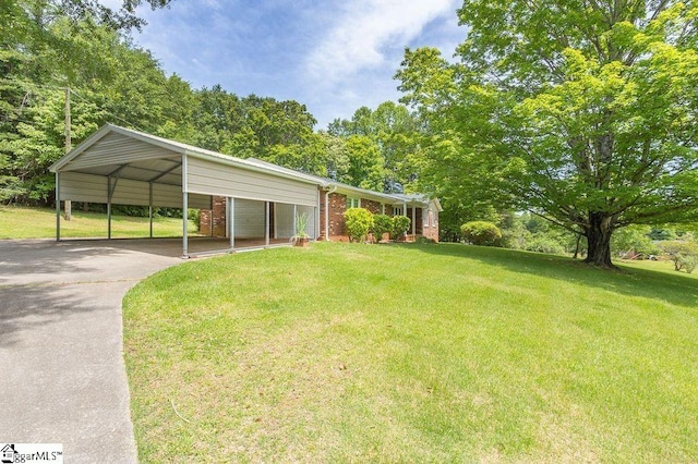 view of yard featuring a carport