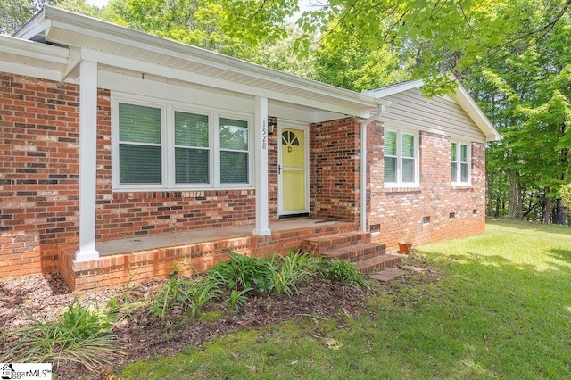 ranch-style house with a front lawn