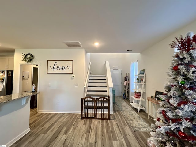 interior space with hardwood / wood-style floors