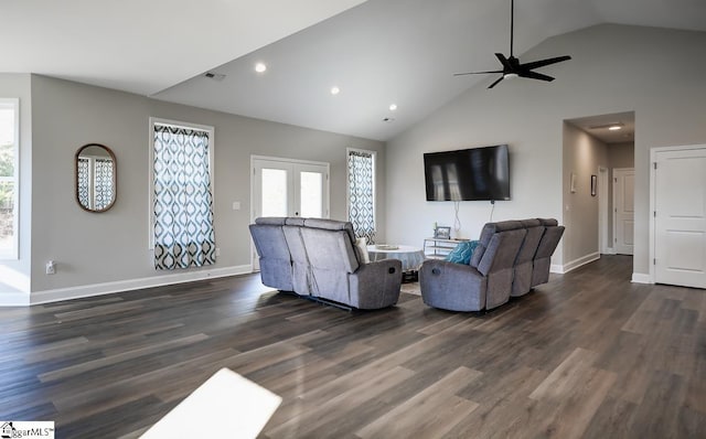 living room featuring ceiling fan, dark wood-type flooring, high vaulted ceiling, and french doors