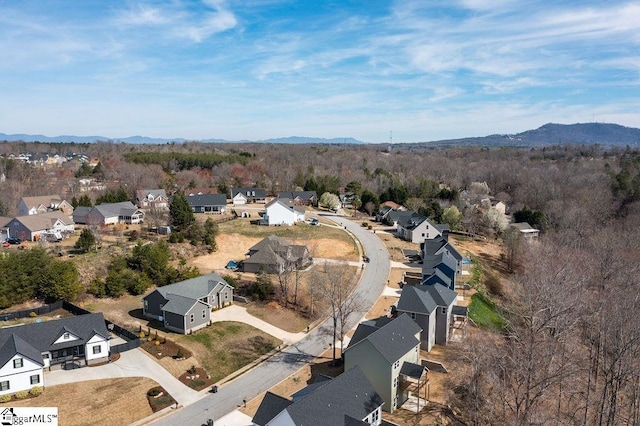 drone / aerial view featuring a mountain view and a residential view