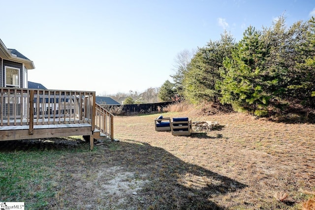 view of yard featuring a wooden deck