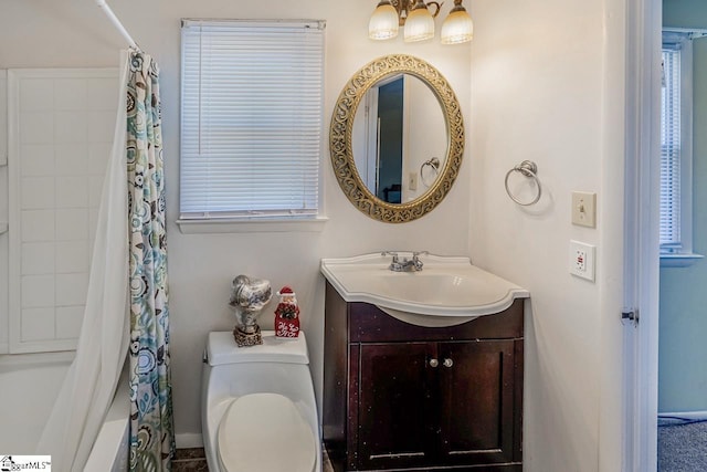 full bathroom featuring vanity, toilet, and shower / bathtub combination with curtain