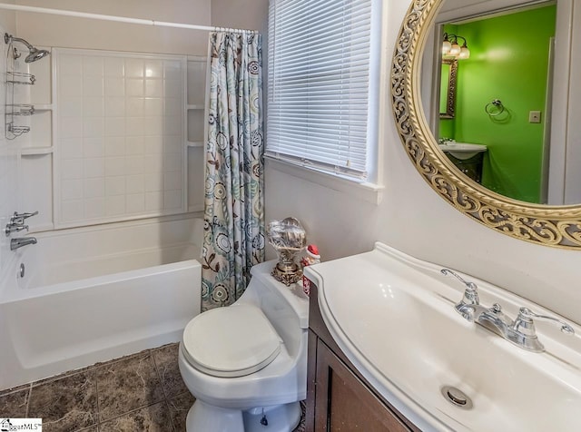 full bathroom with vanity, toilet, and shower / bath combo with shower curtain