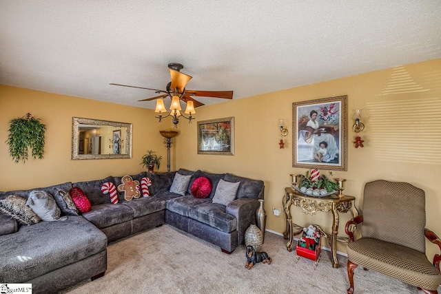 carpeted living room with a textured ceiling and ceiling fan