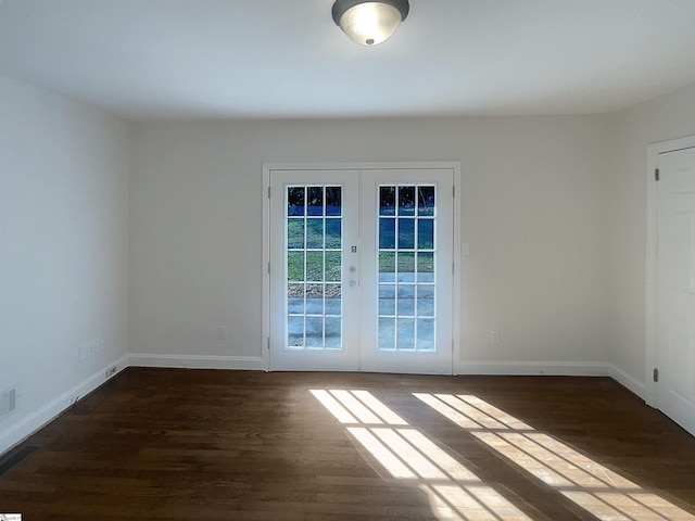 137 Batesview Dr, Greenville, SC 29607 - spare room featuring french doors and dark wood-style flooring