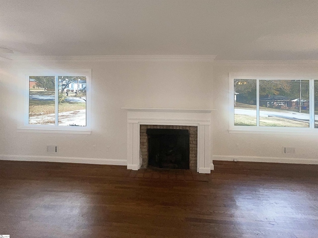 137 Batesview Dr, Greenville, SC 29607 - unfurnished living room featuring ornamental molding, dark wood-style floors, and a fireplace