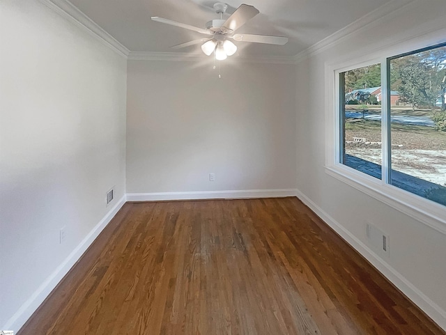 unfurnished room with dark hardwood / wood-style flooring, ceiling fan, and ornamental molding