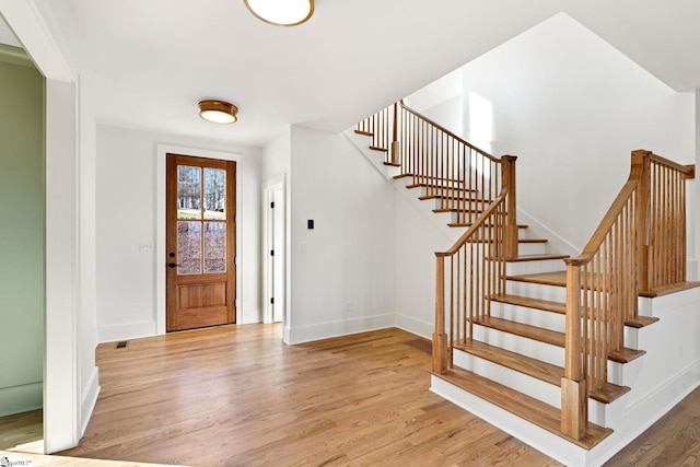 foyer with light wood-type flooring