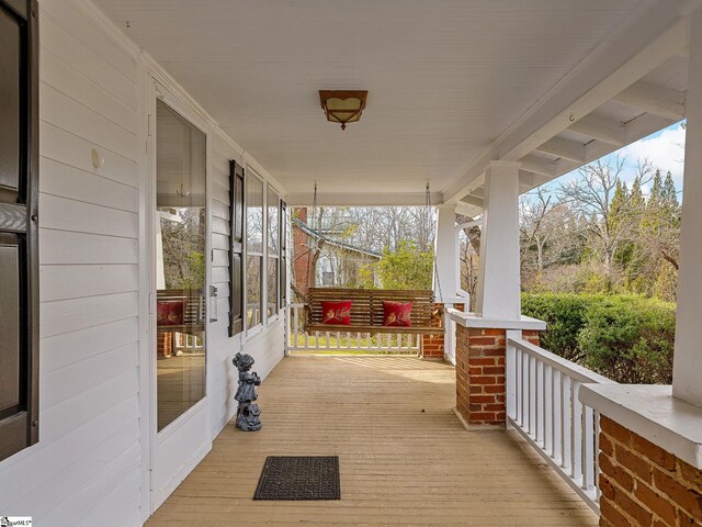 deck with covered porch