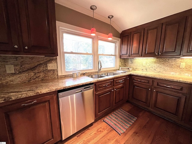 kitchen featuring dishwasher, backsplash, sink, vaulted ceiling, and light hardwood / wood-style flooring