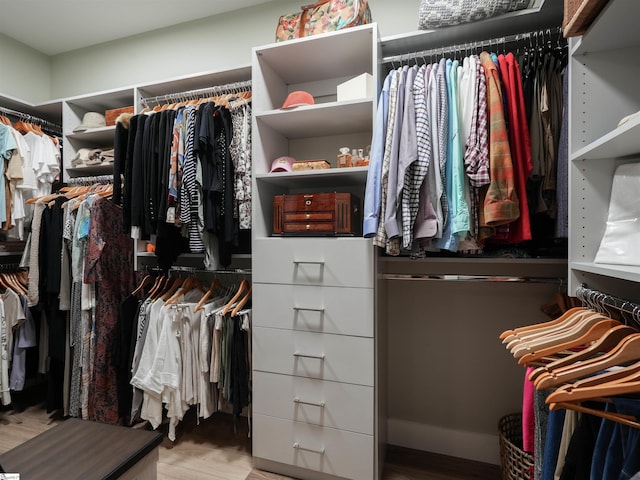 walk in closet featuring light wood-type flooring