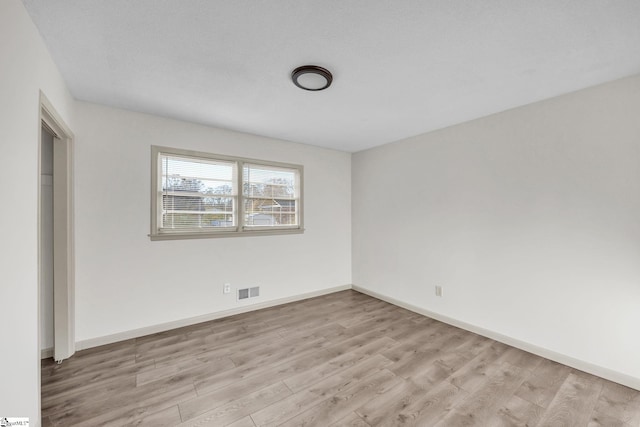 unfurnished bedroom with light hardwood / wood-style flooring