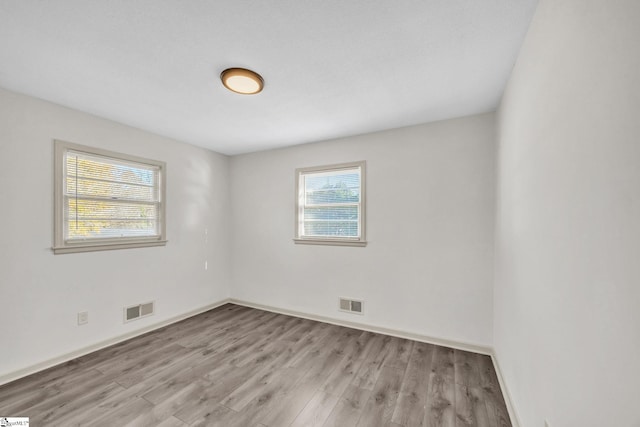 empty room featuring light hardwood / wood-style floors