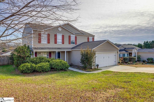 view of front property with a front yard and a garage