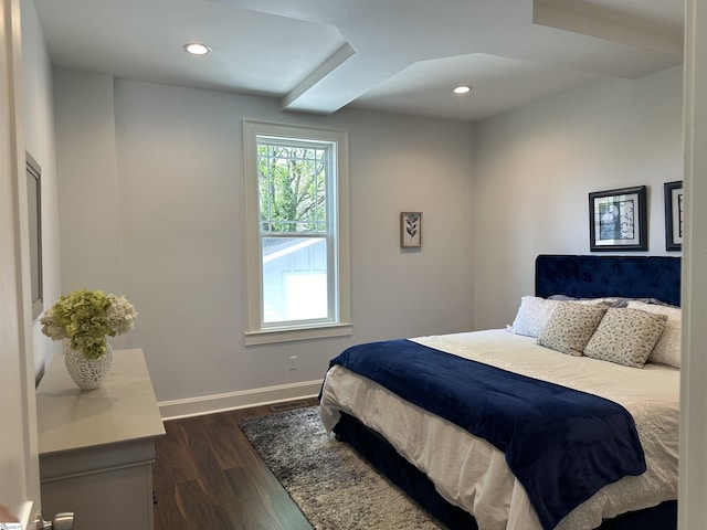 bedroom featuring dark wood-type flooring