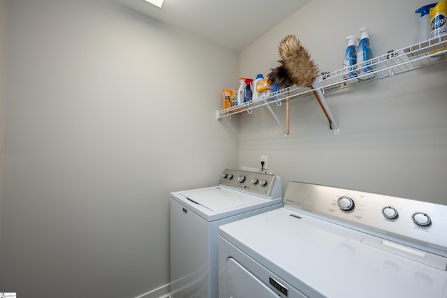 laundry room with washer and dryer