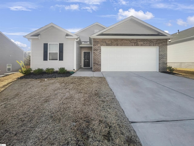 ranch-style home featuring a garage