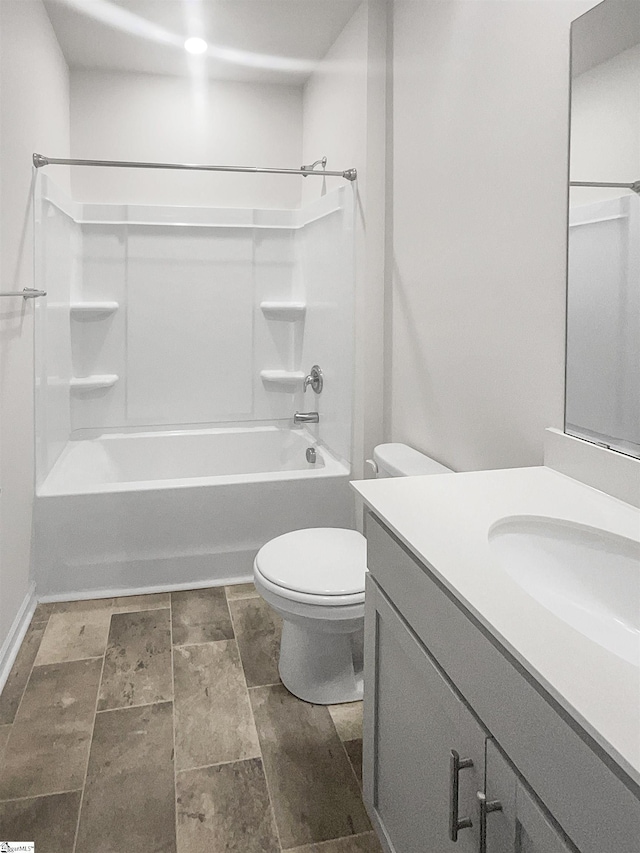 full bathroom featuring vanity, toilet, and shower / tub combination