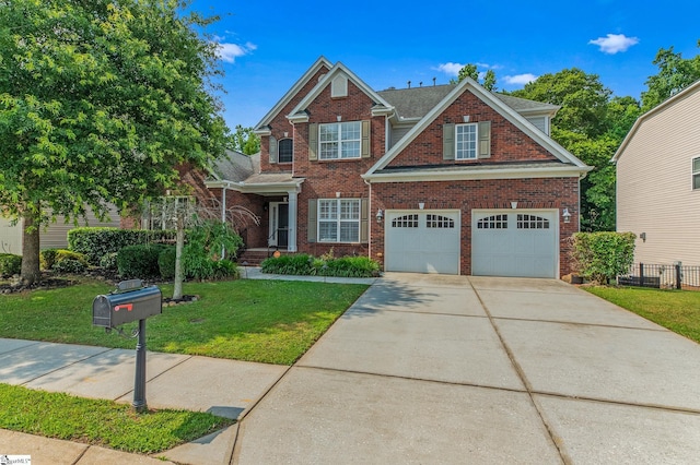 craftsman-style home with a garage and a front lawn