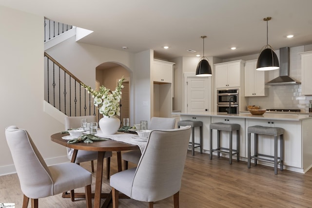 dining room featuring dark hardwood / wood-style flooring