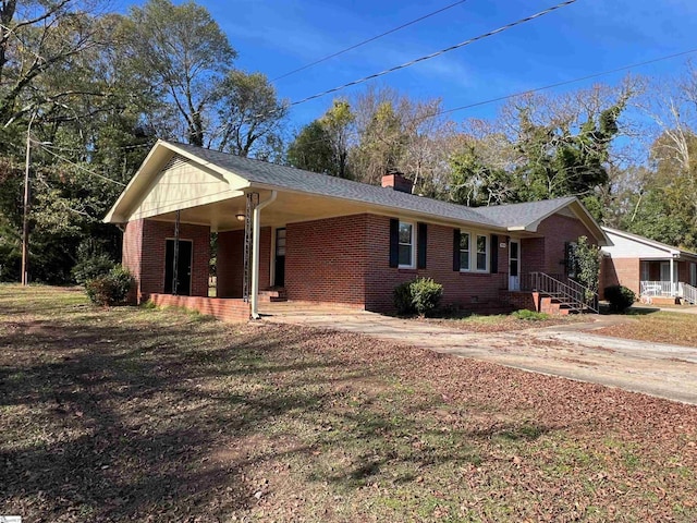 single story home with a carport