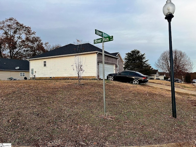 view of home's exterior with a garage