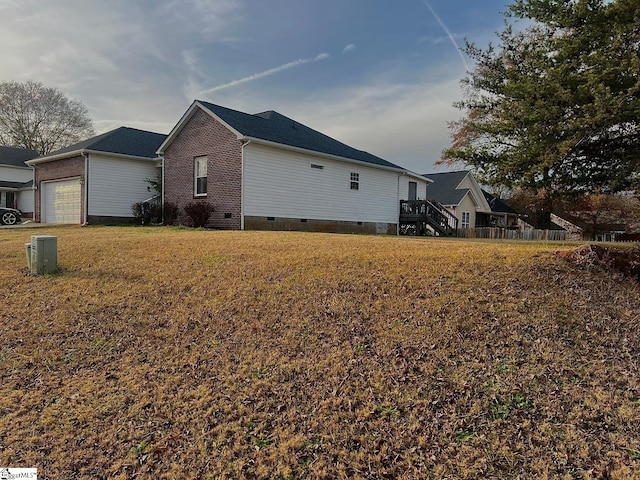 view of home's exterior with a garage