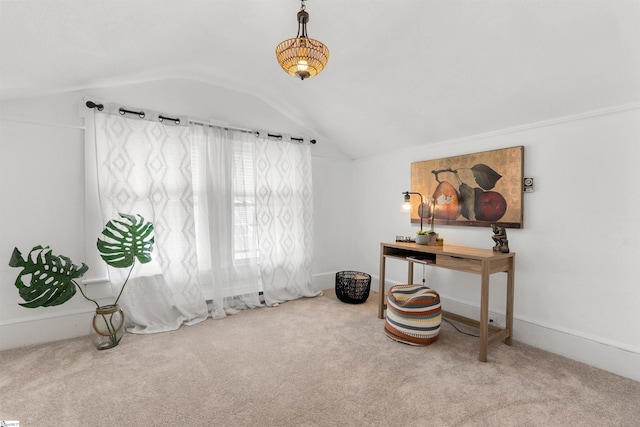 living area with carpet flooring and vaulted ceiling